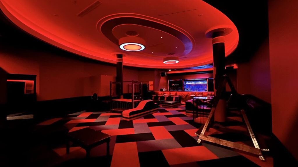Circular lounge with checkered floor